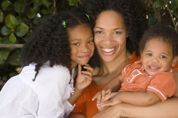 Mother with young girl and toddler boy