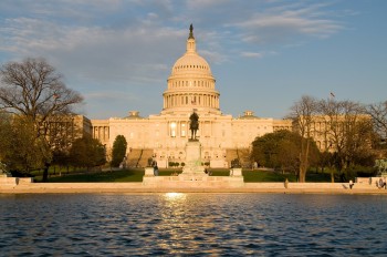 US Capitol Building and reflecting pool and sun