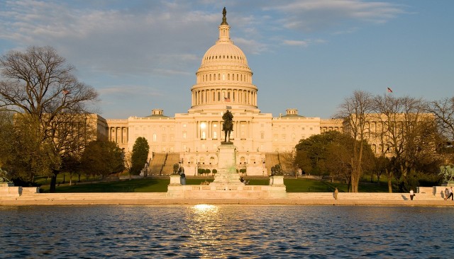US Capitol Building and reflecting pool and sun