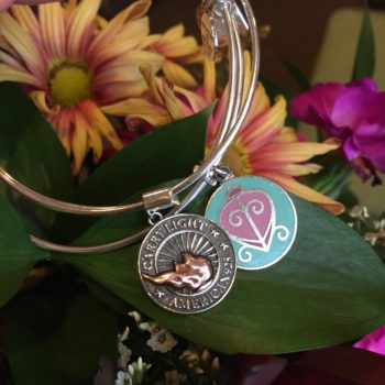 Carry light Alex and Ani bracelet and flower backdrop