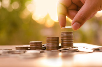 Sack of coins and hands