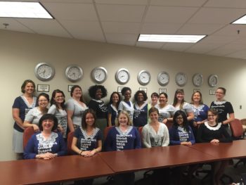 Photo of NNEDV staff honoring the Legacy of RBG by wearing lace collars